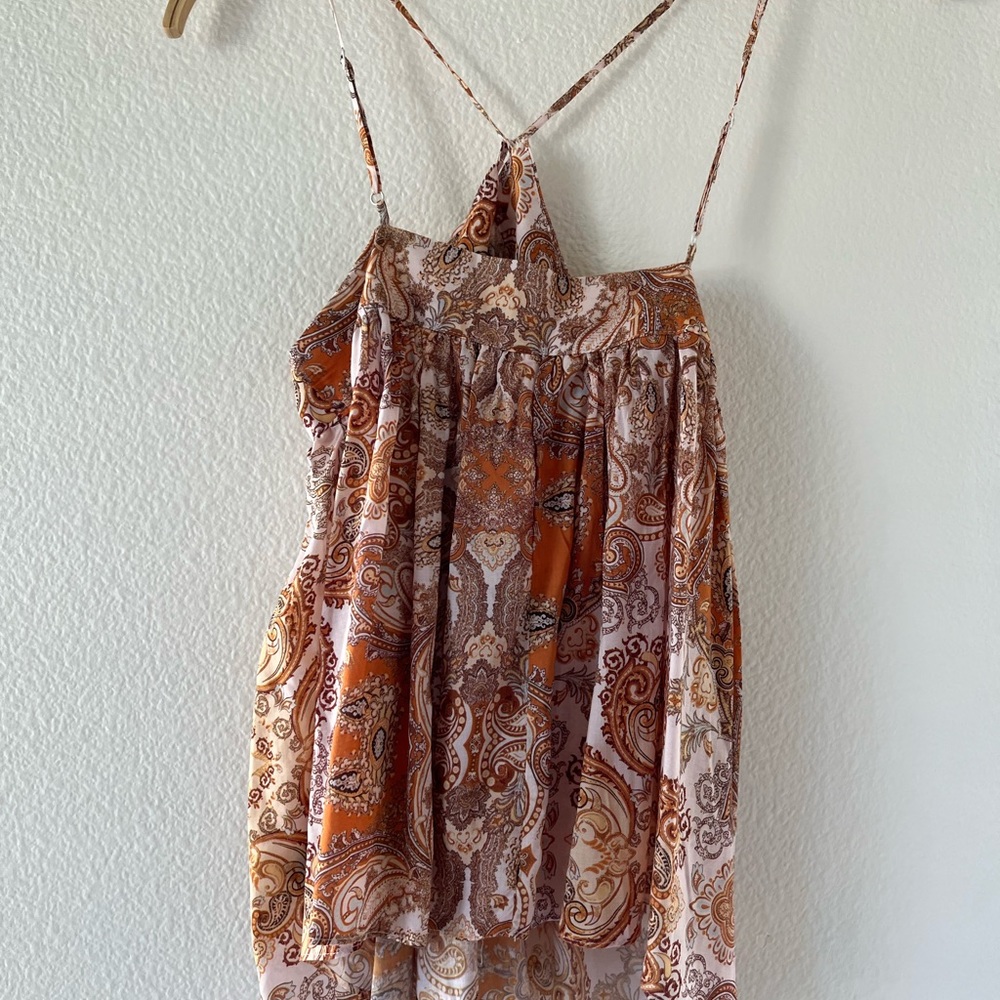 flowy brunch top with boho floral patterns and a high neck tank